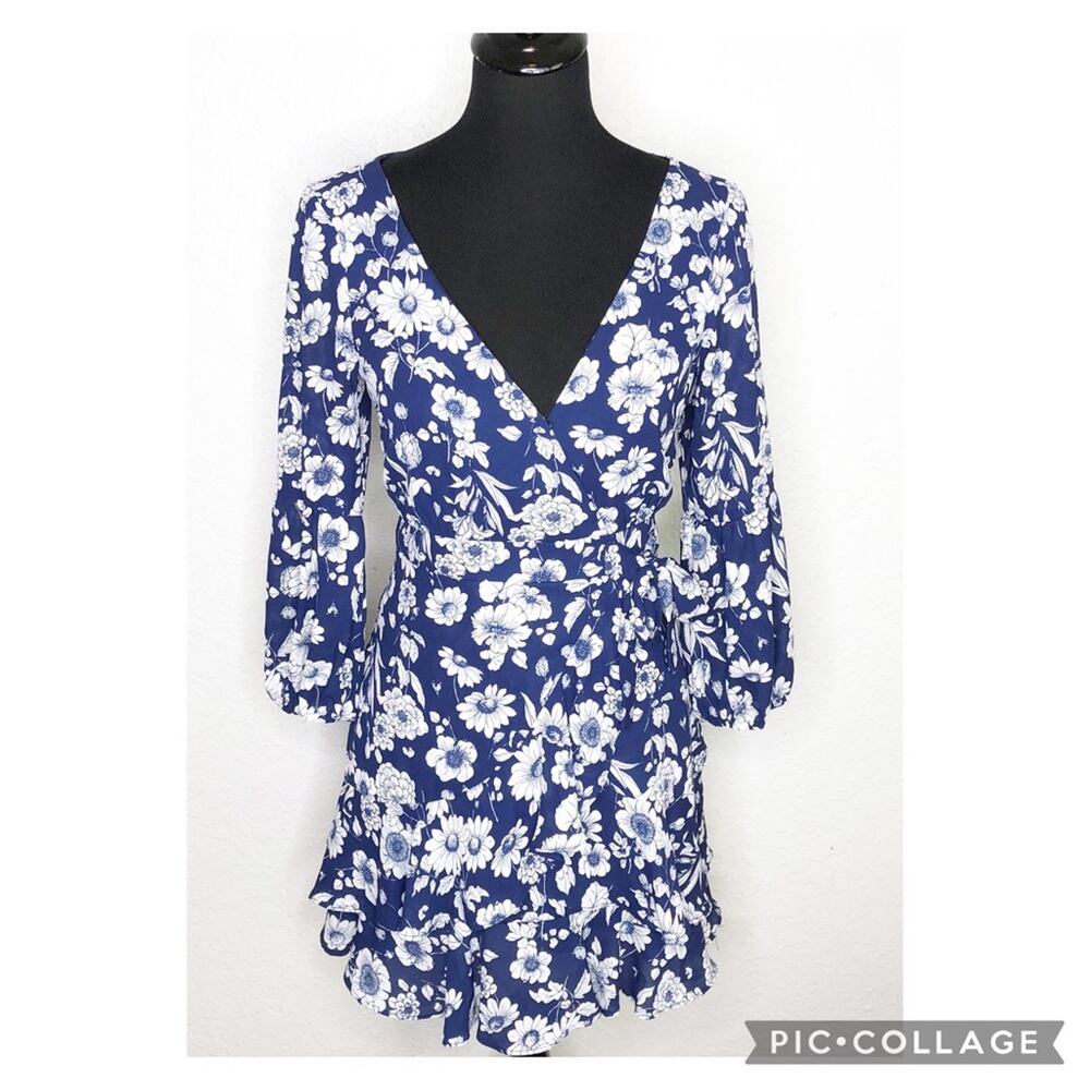 Likely blue white floral faux wrap dress size 4
